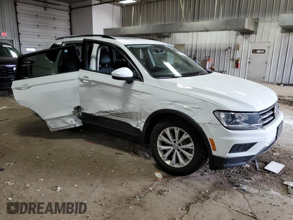 2019 Volkswagen Tiguan SE with VIN 3VV2B7AX7KM030489, listed as a Copart auction lot 52227895 with 58,446 mi miles and Salvage Title. Bid and sale history available at DreamBid. Image 4.
