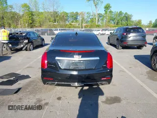 2015 Cadillac CTS Premium AWD with VIN 1G6AZ5S35F0129572, listed as a IAAI auction lot 42045670 with 62,758 mi miles and . Bid and sale history available at DreamBid. Image 16.