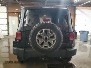 2014 Jeep Wrangler Sport with VIN 1C4AJWAG5EL307945, listed as a Copart auction lot 60152035 with 119,508 mi miles and Salvage title. Bid and sale history available at DreamBid. Image 6.