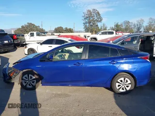 2018 Toyota Prius Two with VIN JTDKARFU2J3056932, listed as a IAAI auction lot 41637372 with 52,731 mi miles. Bid and sale history available at carsss.com. Image 14.