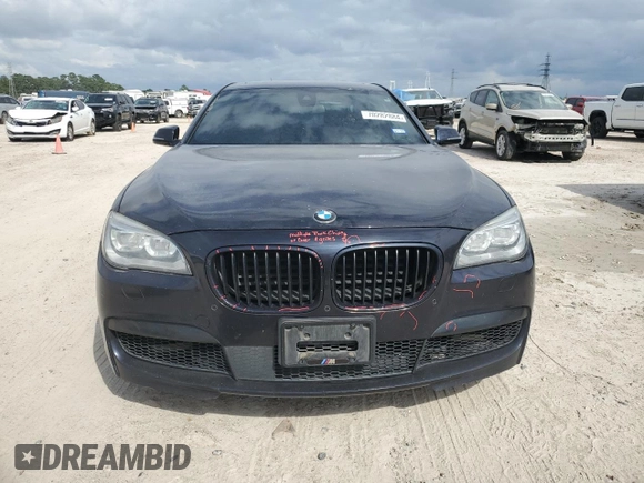 2015 BMW 7 Series 750i with VIN WBAYA8C59FG197642, listed as a Copart auction lot 70282884 with 130,853 mi miles and Salvage title. Bid and sale history available at DreamBid. Image 5.
