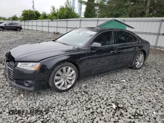 2016 Audi A8 Sport z VIN WAU43AFD2GN005719, wystawiony jako Copart lot #60746275 z przebiegiem 125 802 mil mil oraz Szkoda całkowita • Salvage title. Historia ofert i sprzedaży dostępna na DreamBid. Obrazek 1.