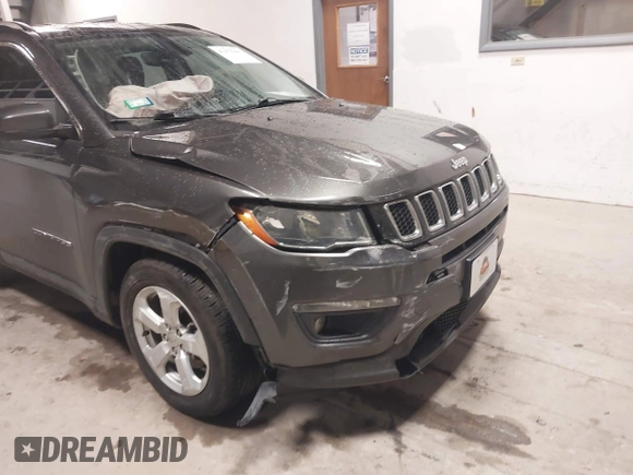 2020 Jeep Compass Latitude with VIN 3C4NJCBB8LT130425, listed as a IAAI auction lot 41475443 with 82,782 mi miles and . Bid and sale history available at carsss.com. Image 6.