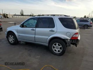 2002 Mercedes-Benz M-Class with VIN 4JGAB75EX2A326747, listed as a Copart auction lot 82106664 with 264,245 mi miles and Salvage Title. Bid and sale history available at carsss.com. Image 2.