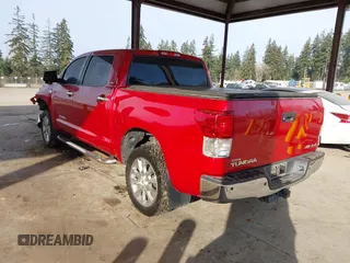 2012 Toyota Tundra 4WD Truck LTD with VIN 5TFHW5F13CX268552, listed as a IAAI auction lot 41461707 with 199,502 mi miles. Bid and sale history available at carsss.com. Image 3.