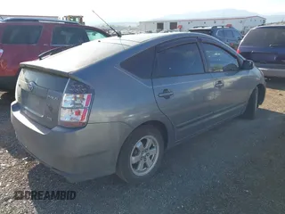2004 Toyota Prius with VIN JTDKB20U640038596, listed as a IAAI auction lot 42120941 with 245,743 mi miles. Bid and sale history available at carsss.com. Image 4.