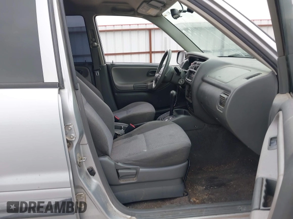 2003 Chevrolet Tracker z VIN 2CNBE134736919970, wystawiony jako IAAI lot #42203446 z przebiegiem 158 872 mil mil oraz . Historia ofert i sprzedaży dostępna na DreamBid. Obrazek 5.