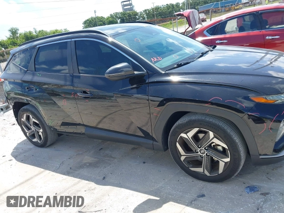 2022 Hyundai Tucson SEL with VIN 5NMJC3AE2NH019454, listed as a IAAI auction lot 42318154 with 43,839 mi miles and . Bid and sale history available at DreamBid. Image 14.