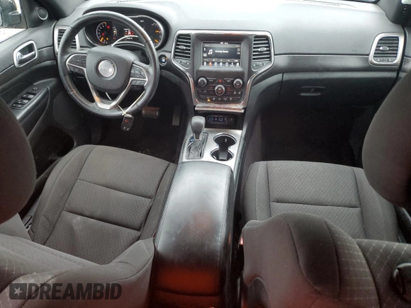 2018 Jeep Grand Cherokee Laredo E with VIN 1C4RJFAG5JC113283, listed as a Copart auction lot 57569595 with 90,897 mi miles and Salvage title. Bid and sale history available at DreamBid. Image 8.