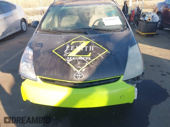 2006 Toyota Prius z VIN JTDKB22U763141508, wystawiony jako IAAI lot #41449413 z przebiegiem 243 914 mil mil oraz . Historia ofert i sprzedaży dostępna na DreamBid. Obrazek 11.