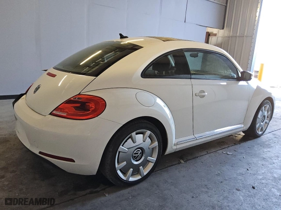2012 Volkswagen Beetle 2.5L w/Sun/Sound/Nav PZEV with VIN 3VWHP7AT5CM638470, listed as a Copart auction lot 83471284 with 87,912 mi miles and Clean Title. Bid and sale history available at carsss.com. Image 3.