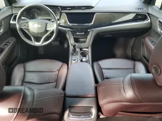 2021 Cadillac XT6 Premium Luxury z VIN 1GYKPCRSXMZ230618, wystawiony jako Copart lot #81022824 z przebiegiem Nie podano mil oraz Szkoda całkowita • Salvage title. Historia ofert i sprzedaży dostępna na DreamBid. Obrazek 8.