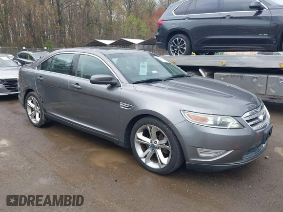 2011 Ford Taurus SHO with VIN 1FAHP2KT8BG100347, listed as a IAAI auction lot 41964597 with 104,603 mi miles and . Bid and sale history available at DreamBid. Image 1.