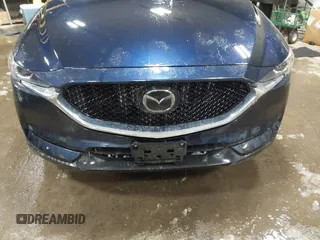 2020 Mazda CX-5 Touring z VIN JM3KFBCM9L0843045, wystawiony jako IAAI lot #41361008 z przebiegiem 76 107 mil mil oraz . Historia ofert i sprzedaży dostępna na DreamBid. Obrazek 12.