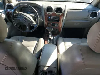 2007 GMC Envoy SLE z VIN 1GKDT13SX72118720, wystawiony jako Copart lot #88278185 z przebiegiem 212 605 mil mil oraz Szkody całkowita. Historia ofert i sprzedaży dostępna na DreamBid. Obrazek 8.