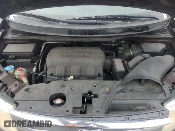 2011 Honda Odyssey EX-L with VIN 5FNRL5H69BB057080, listed as a Copart auction lot 41984785 with 152,963 mi miles and Salvage Title. Bid and sale history available at DreamBid. Image 12.