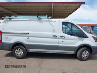 2019 Ford Transit with VIN 1FTYR1YM2KKA26600, listed as a IAAI auction lot 42071985 with 141,993 mi miles. Bid and sale history available at carsss.com. Image 13.