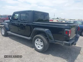 2022 Jeep Gladiator Willys Sport z VIN 1C6HJTAG7NL161701, wystawiony jako IAAI lot #42097144 z przebiegiem 32 989 mil mil oraz . Historia ofert i sprzedaży dostępna na DreamBid. Obrazek 3.