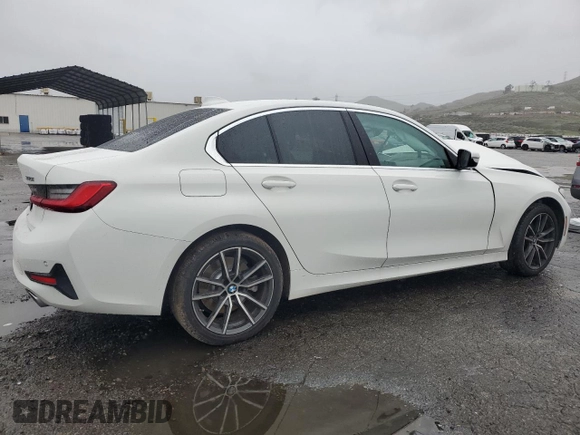 2021 BMW 3 Series 330i with VIN 3MW5R1J0XM8B48990, listed as a Copart auction lot 49277185 with 69,776 mi miles and Salvage Title. Bid and sale history available at carsss.com. Image 3.