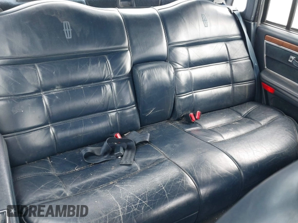 1991 Lincoln Continental with VIN 1LNCM9745MY632946, listed as a IAAI auction lot 41561785 with 124,186 mi miles and . Bid and sale history available at DreamBid. Image 8.