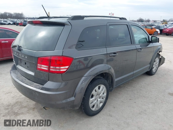 2017 Dodge Journey SE with VIN 3C4PDCABXHT694909, listed as a IAAI auction lot 41640828 with 188,657 mi miles and . Bid and sale history available at DreamBid. Image 4.