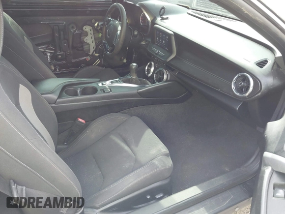2019 Chevrolet Camaro 1LT z VIN 1G1FA1RX1K0127249, wystawiony jako IAAI lot #42240323 z przebiegiem 69 945 mil mil oraz . Historia ofert i sprzedaży dostępna na DreamBid. Obrazek 5.