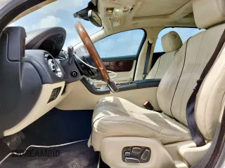 2015 Jaguar XJ Portfolio with VIN SAJWA2GZ7F8V82990, listed as a Copart auction lot 63325535 with 113,892 mi miles and Salvage title. Bid and sale history available at DreamBid. Image 7.