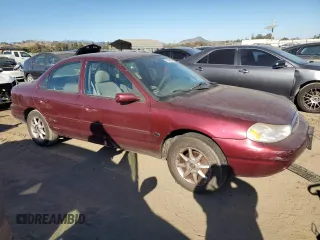 1998 Ford Contour SE z VIN 1FAFP6639WK279655, wystawiony jako Copart lot #77660774 z przebiegiem 89 161 mil mil oraz Szkoda całkowita • Salvage title. Historia ofert i sprzedaży dostępna na DreamBid. Obrazek 4.