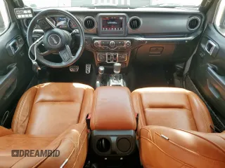 2022 Jeep Wrangler Unlimited Willys Sport with VIN 1C4HJXDMXNW158534, listed as a Copart auction lot 62179995 with 66,947 mi miles and Salvage title. Bid and sale history available at DreamBid. Image 8.