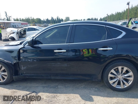 2012 Infiniti M with VIN JN1BY1AR4CM396129, listed as a IAAI auction lot 42555601 with 131,852 mi miles and . Bid and sale history available at DreamBid. Image 14.