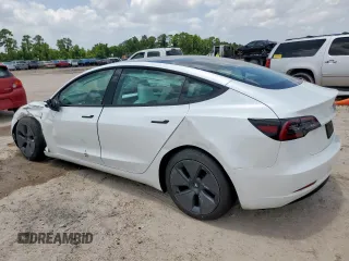 2023 Tesla Model 3 z VIN 5YJ3E1EAXPF600008, wystawiony jako Copart lot #61063675 z przebiegiem 58 733 mil mil oraz Szkoda całkowita • Salvage title. Historia ofert i sprzedaży dostępna na DreamBid. Obrazek 2.