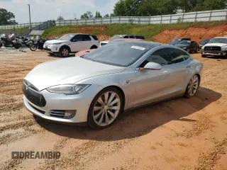 2014 Tesla Model S 60 with VIN 5YJSA1H16EFP62363, listed as a Copart auction lot 58370095 with 157,726 mi miles and Clean title. Bid and sale history available at DreamBid. Image 1.