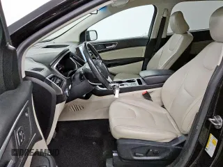 2021 Ford Edge Titanium с VIN 2FMPK4K94MBA27083, выставлен на аукционе Copart как лот 62149285 с пробегом 128 325 миль миль и Чистый • Clean title. История ставок и продаж доступна на DreamBid. Изображение 7.