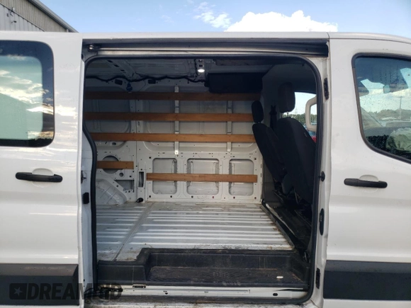 2021 Ford Transit Cargo with VIN 1FTBR1Y87MKA44540, listed as a Copart auction lot 74791034 with 128,242 mi miles and Salvage title. Bid and sale history available at DreamBid. Image 11.
