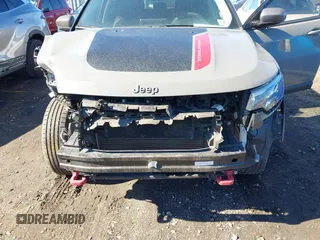 2022 Jeep Compass Trailhawk with VIN 3C4NJDDB4NT136213, listed as a IAAI auction lot 41689612 with 50,091 mi miles and . Bid and sale history available at DreamBid. Image 6.