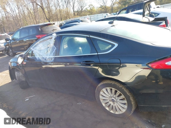 2016 Ford Fusion Energi SE Luxury with VIN 3FA6P0PU5GR373212, listed as a IAAI auction lot 41875297 with 93,049 mi miles. Bid and sale history available at carsss.com. Image 14.
