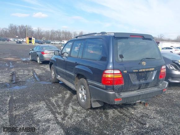 2002 Toyota Land Cruiser with VIN JTEHT05J122018974, listed as a IAAI auction lot 41543290 with 266,926 mi miles. Bid and sale history available at carsss.com. Image 3.
