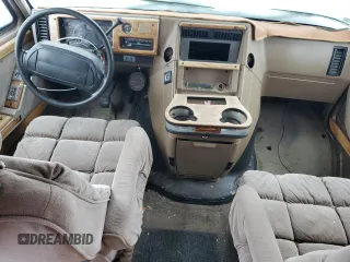 1995 GMC Vandura z VIN 1GDEG25KXSF550311, wystawiony jako Copart lot #78730594 z przebiegiem 149 663 mil mil oraz Szkody całkowita. Historia ofert i sprzedaży dostępna na DreamBid. Obrazek 8.