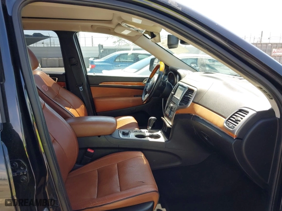 2012 Jeep Grand Cherokee Overland with VIN 1C4RJFCT7CC185602, listed as a IAAI auction lot 42018715 with 91,507 mi miles. Bid and sale history available at carsss.com. Image 5.
