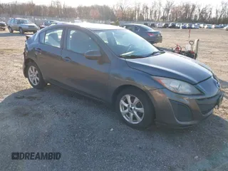 2010 Mazda Mazda3 i Touring with VIN JM1BL1SG2A1314938, listed as a IAAI auction lot 41854222 with 214,285 mi miles. Bid and sale history available at carsss.com. Image 1.