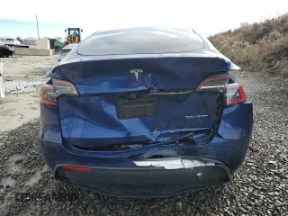 2024 Tesla Model Y Long Range с VIN 7SAYGDEE5RF983771, выставлен на аукционе Copart как лот 86153274 с пробегом 4 105 миль миль и Списание • Salvage title. История ставок и продаж доступна на DreamBid. Изображение 6.