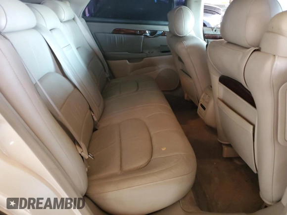 2001 Cadillac DeVille DHS z VIN 1G6KE57Y41U150631, wystawiony jako Copart lot #61805295 z przebiegiem 96 158 mil mil oraz Czysty tytuł • Clean title. Historia ofert i sprzedaży dostępna na DreamBid. Obrazek 10.