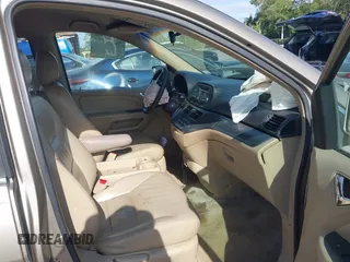 2005 Honda Odyssey EX with VIN 5FNRL38495B401742, listed as a IAAI auction lot 42133434 with 162,161 mi miles and . Bid and sale history available at carsss.com. Image 5.