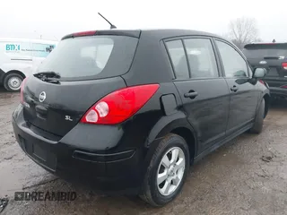 2009 Nissan Versa 1.8 SL with VIN 3N1BC13EX9L390055, listed as a IAAI auction lot 41455877 with 126,718 mi miles. Bid and sale history available at carsss.com. Image 4.