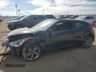 2015 Hyundai Veloster z VIN KMHTC6AD9FU243280, wystawiony jako Copart lot #55833475 z przebiegiem 72 262 mil mil oraz Szkoda całkowita • Salvage title. Historia ofert i sprzedaży dostępna na DreamBid. Obrazek 1.