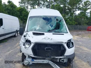2024 Ford Transit Cargo with VIN 1FTBR3X86RKA46123, listed as a IAAI auction lot 42490695 with 13,258 mi miles and . Bid and sale history available at DreamBid. Image 12.