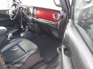 2020 Jeep Wrangler Unlimited Rubicon with VIN 1C4HJXFG1LW141335, listed as a IAAI auction lot 42724973 with 59,843 mi miles and . Bid and sale history available at DreamBid. Image 5.