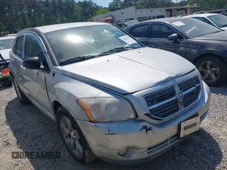 2011 Dodge Caliber Mainstreet with VIN 1B3CB3HAXBD107494, listed as a IAAI auction lot 42071328 with 146,936 mi miles. Bid and sale history available at carsss.com. Image 1.