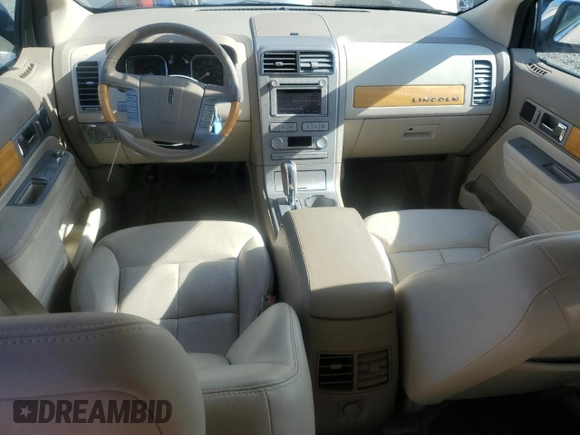 2007 Lincoln MKX z VIN 2LMDU68C97BJ06964, wystawiony jako Copart lot #55771815 z przebiegiem 89 271 mil mil oraz Szkoda całkowita • Salvage title. Historia ofert i sprzedaży dostępna na DreamBid. Obrazek 8.
