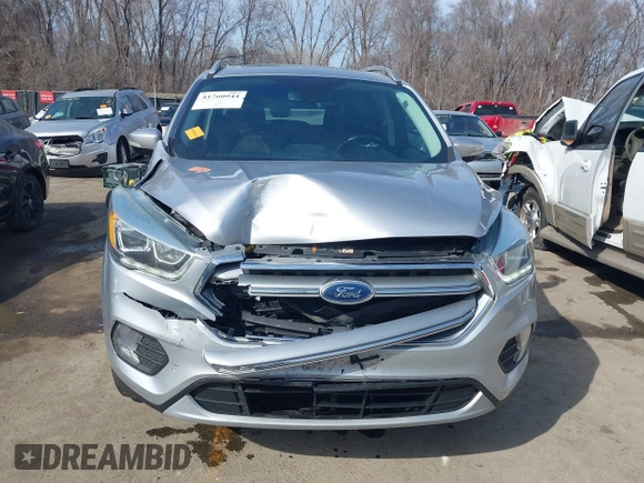 2017 Ford Escape Titanium with VIN 1FMCU0JD3HUB13234, listed as a IAAI auction lot 41760944 with 113,361 mi miles. Bid and sale history available at carsss.com. Image 12.